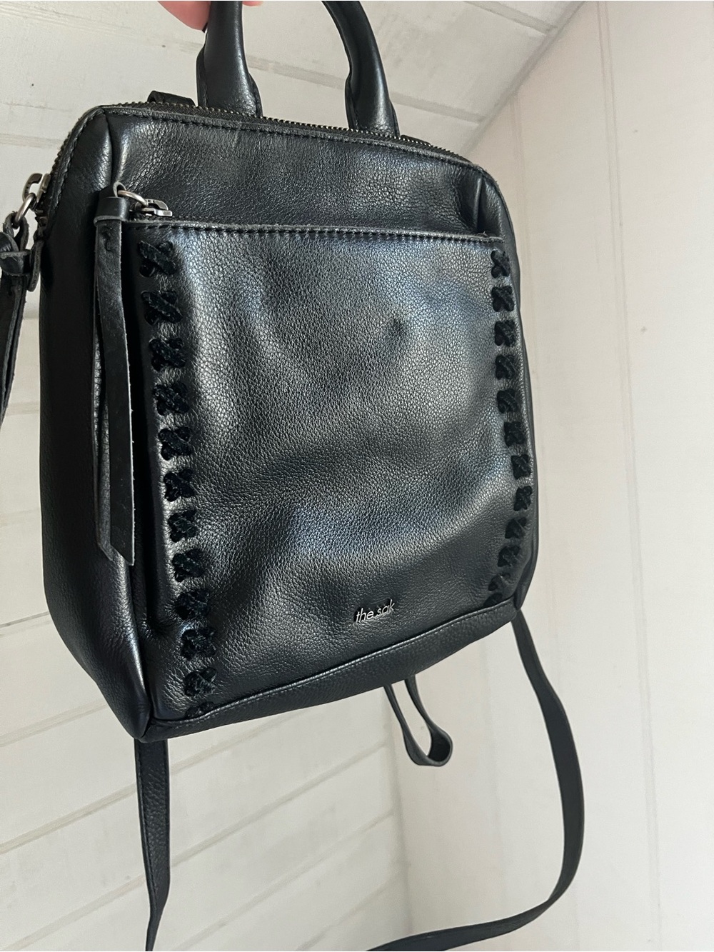 The Sak Black Leather Mini Backpack Crossbody with Woven Trim
